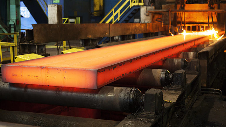 Heated metal on conveyor