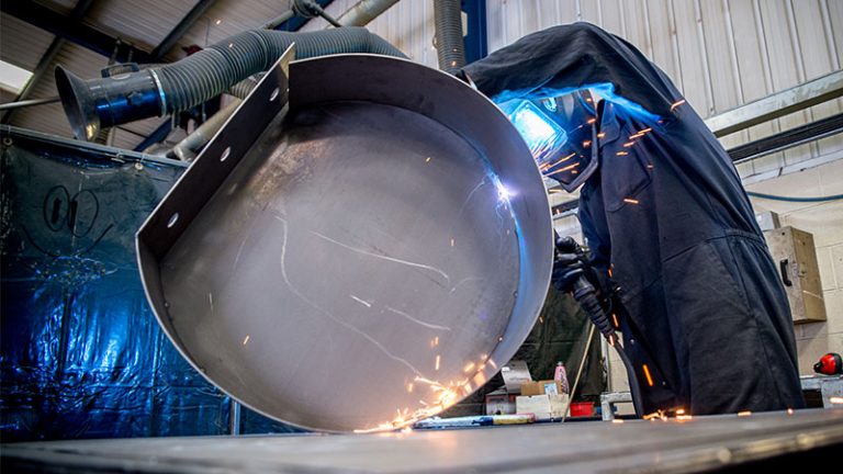 Dustcheck employee welding