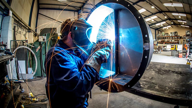 Dustcheck employee welding